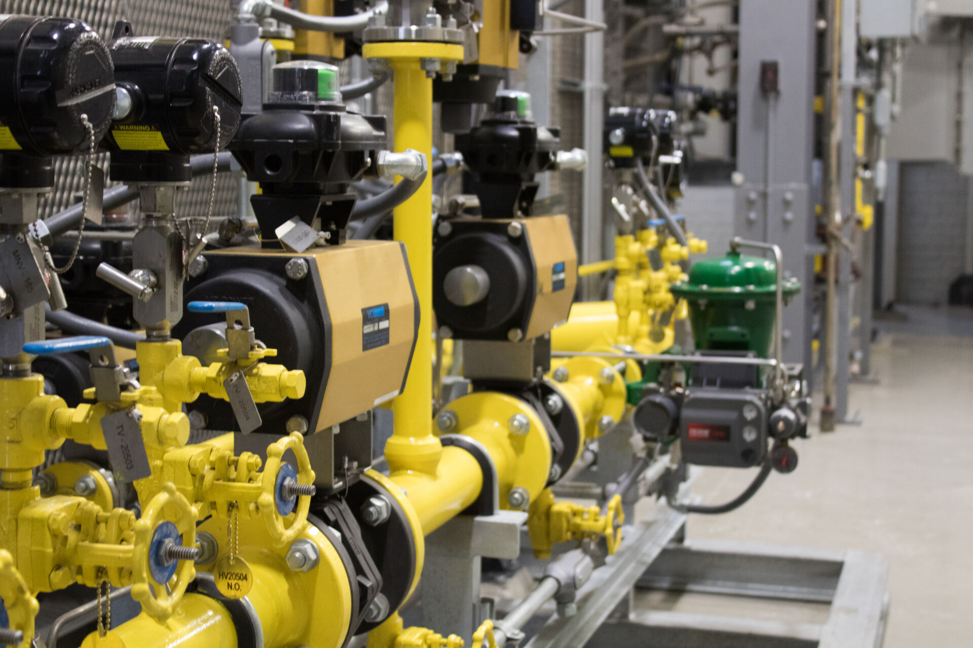 Natural gas piping, valves, and monitoring equipment installed as part of Eastern Michigan University’s cogeneration facility modernization to enhance efficiency, safety, and system control.